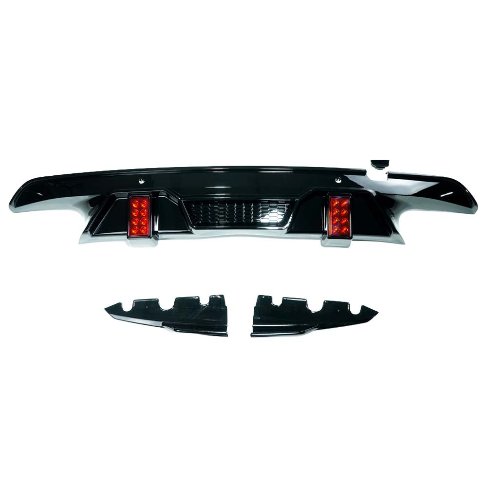 Gloss black LED diffuser for BMW X5M F95 2019+ by CT Carbon, showcasing sleek design and high-quality carbon fiber details.