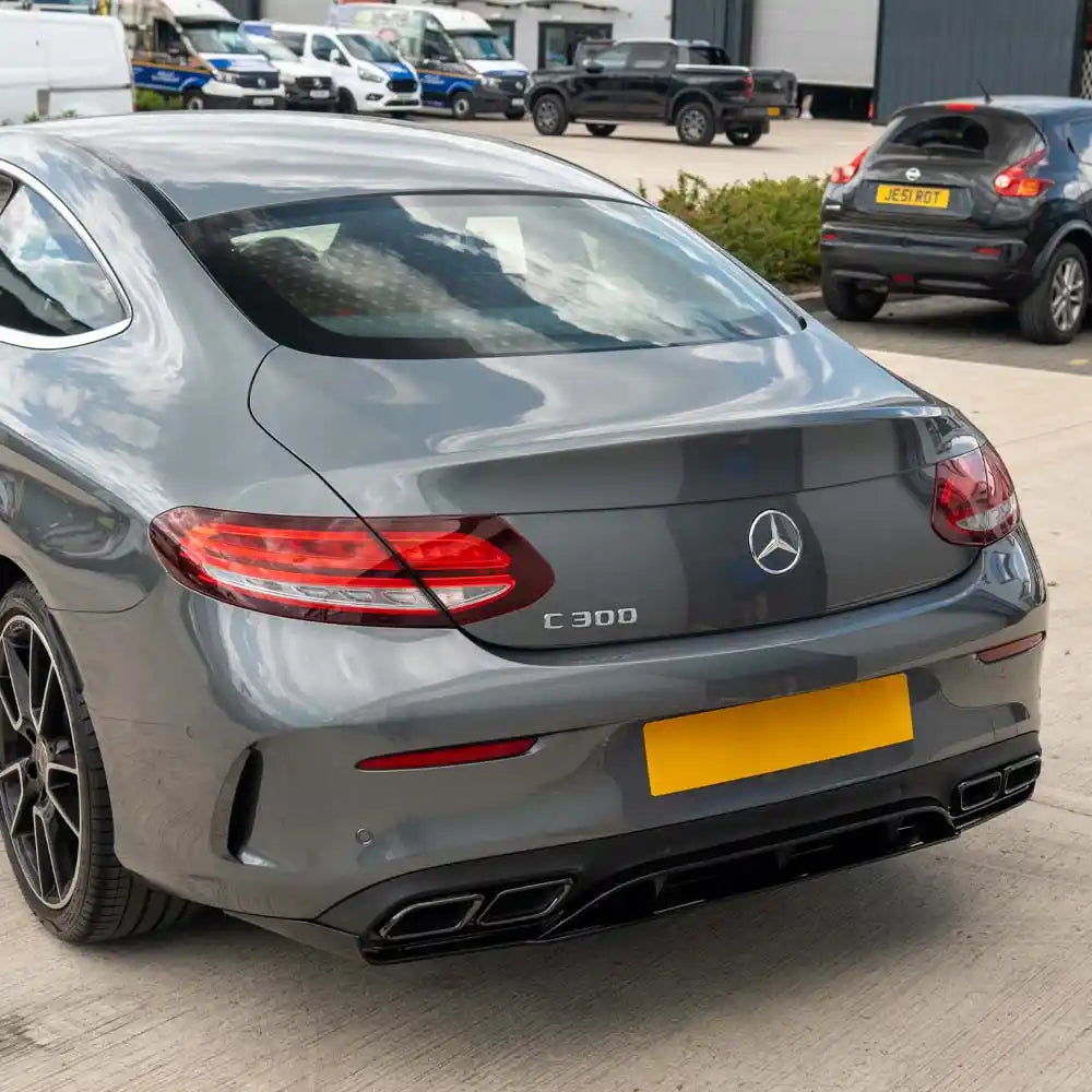 Mercedes C-Class Coupe W205 diffuser with gloss black finish and black exhaust tips, designed by CT Carbon.
