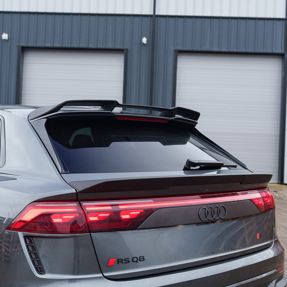 Audi RSQ8 facelift 2025+ carbon fiber full kit by CT Carbon, showing detailed carbon fiber components on a sleek vehicle.