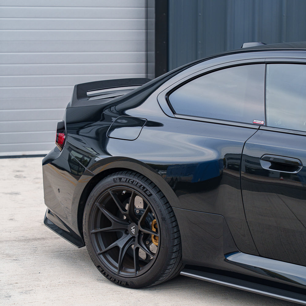 BMW G87 M2 CT Carbon full car conversion kit featuring carbon fiber components, shown installed on the vehicle.