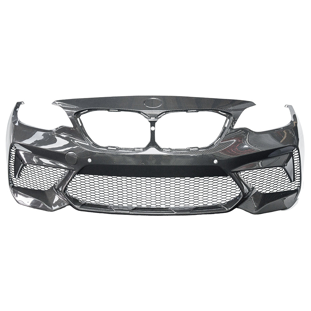 BMW F87 M2C carbon pre-preg fibre front bumper by CT Carbon, showcasing sleek aerodynamic design and lightweight construction.