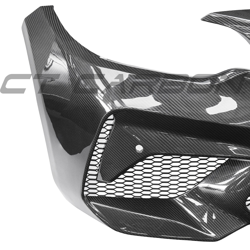 BMW F87 M2C carbon pre-preg fibre front bumper by CT Carbon, showing sleek aerodynamic design and detailed carbon fibre finish.