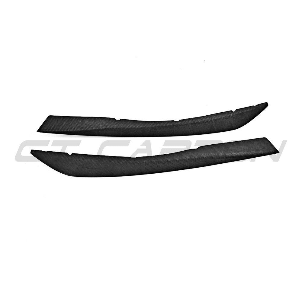 Carbon fibre headlight eyebrows for Audi A5/S5/RS5 B9 Coupe 2016-2019 by CT Carbon, shown on a sleek black vehicle.