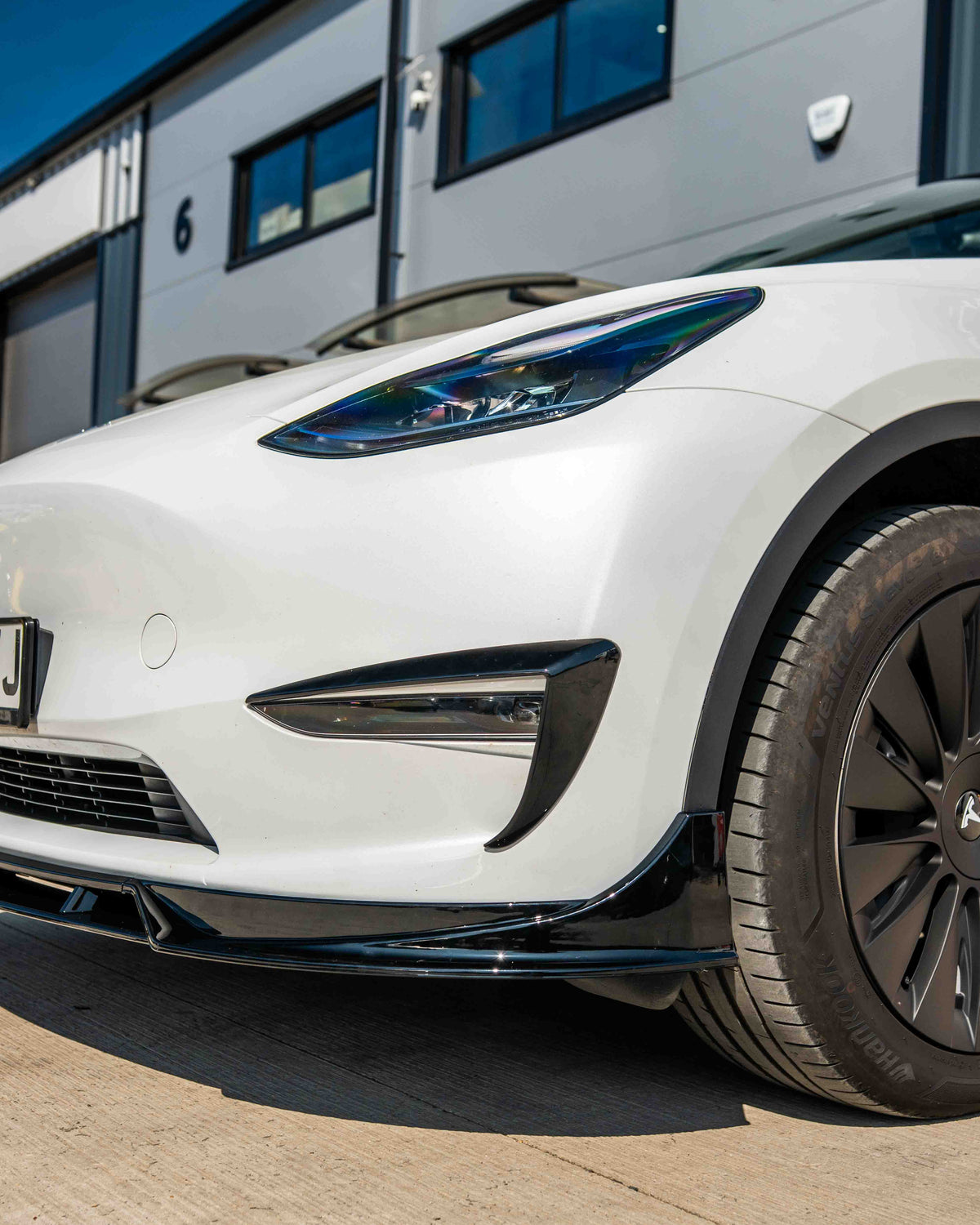 Full gloss black kit for Tesla Model Y MK1 2020-2025 by CT Carbon, featuring sleek, high-quality car wrap or accessories.