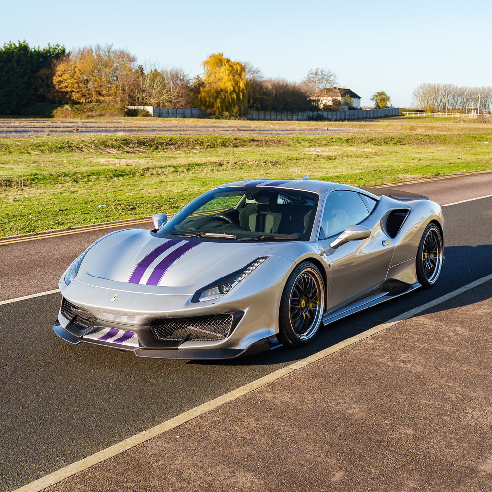 CT Carbon Ferrari 488 Pista carbon fibre kit installed on the sports car, showcasing sleek, lightweight carbon fibre details.