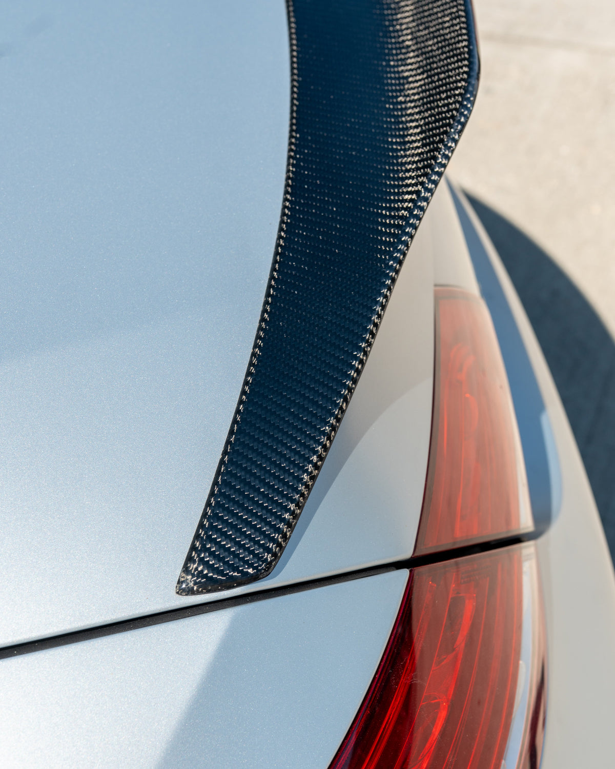 Mercedes C63/C63S W205 coupe carbon spoiler by CT Carbon, showing sleek aerodynamic design and glossy black finish.