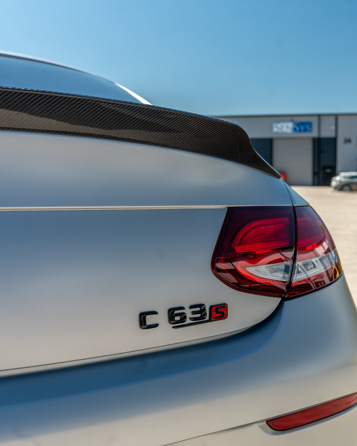 CT Carbon Mercedes C63/C63S W205 coupe carbon spoiler, sleek aerodynamic design, shown on the car's rear.