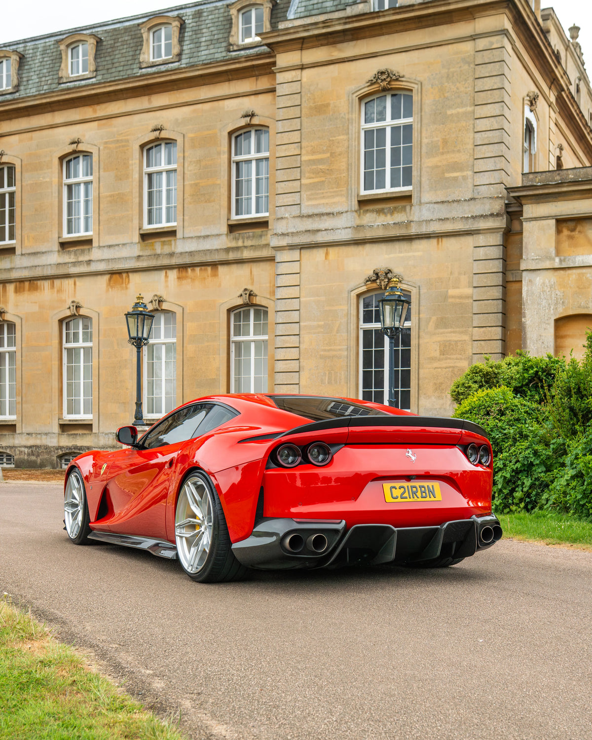 CT Carbon Ferrari 812 Superfast Carbon Fibre Kit V1, close-up of sleek carbon fibre components on the sports car.