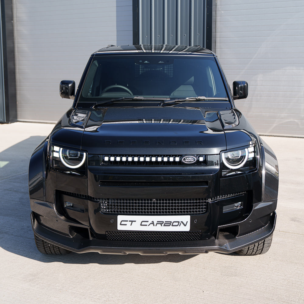 Yellow LED grille for Land Rover Defender L663 2019+ by CT Carbon, showing the front view with bright yellow lighting detail.