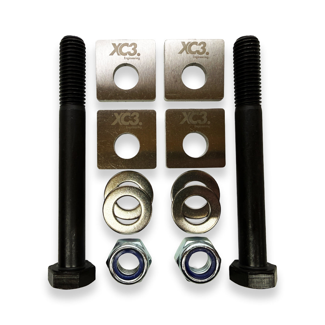 BMW M3 E9X E92 camber lockout shims for suspension and alignment by XC3 Engineering, showing the metal shims on a white background.