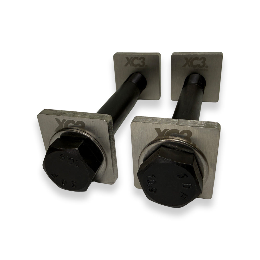 BMW M3 E9X E92 camber lockout shims by XC3 Engineering for suspension and alignment adjustment, shown in the image.