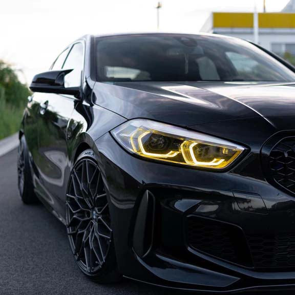 BMW F40/F44 M-Sport yellow adaptive DRL module set by CT Carbon, featuring sleek LED daytime running lights.