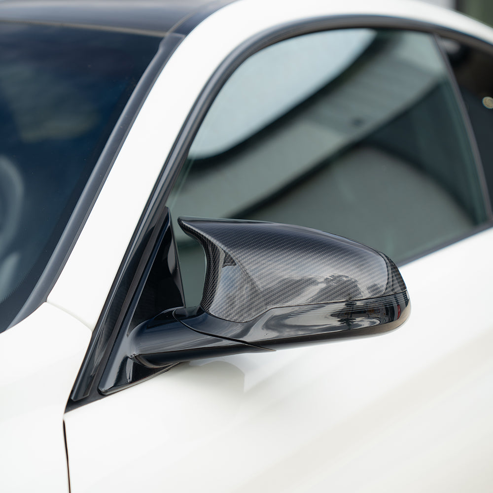 BMW F80/F82/F83/F87 M2C M3 M4 Carbon Fibre Mirror Accessories by CT Carbon, RHD only, showing sleek carbon fibre mirror covers.