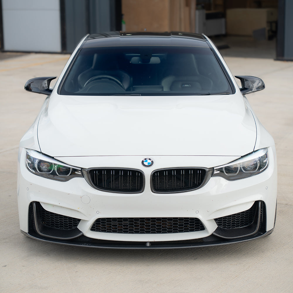 BMW F80/F82/F83/F87 M2C/M3/M4 carbon fibre mirrors by CT Carbon, RHD only, showcasing sleek, lightweight aerodynamic accessory design.