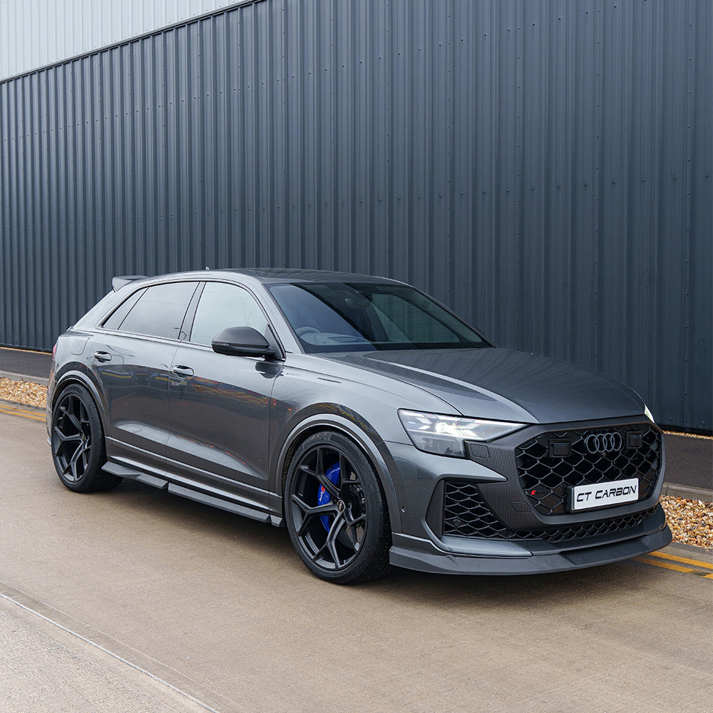 CT Carbon Audi RSQ8 2025+ facelift carbon fiber full kit installed, showcasing sleek wheel gap and high-quality material details.
