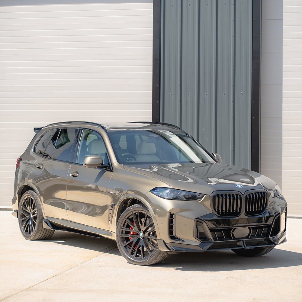 BMW G05 X5 LCI full gloss black kit by CT Carbon, featuring sleek, reflective black car accessories on a BMW G05 X5.