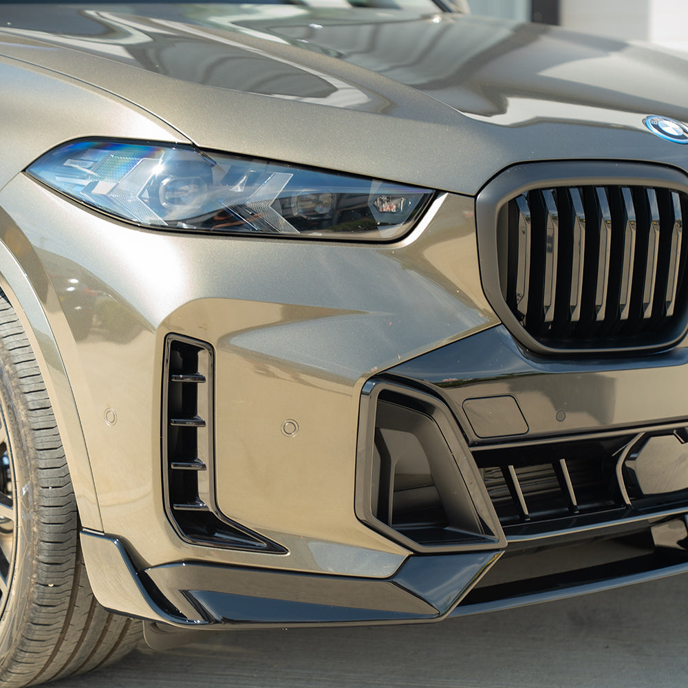 Full gloss black kit for BMW G05 X5 LCI by CT Carbon, showing sleek, shiny exterior accessories on the vehicle.
