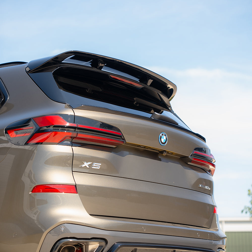 Full gloss black kit for BMW G05 X5 LCI by CT Carbon, featuring sleek, high-quality exterior enhancements.