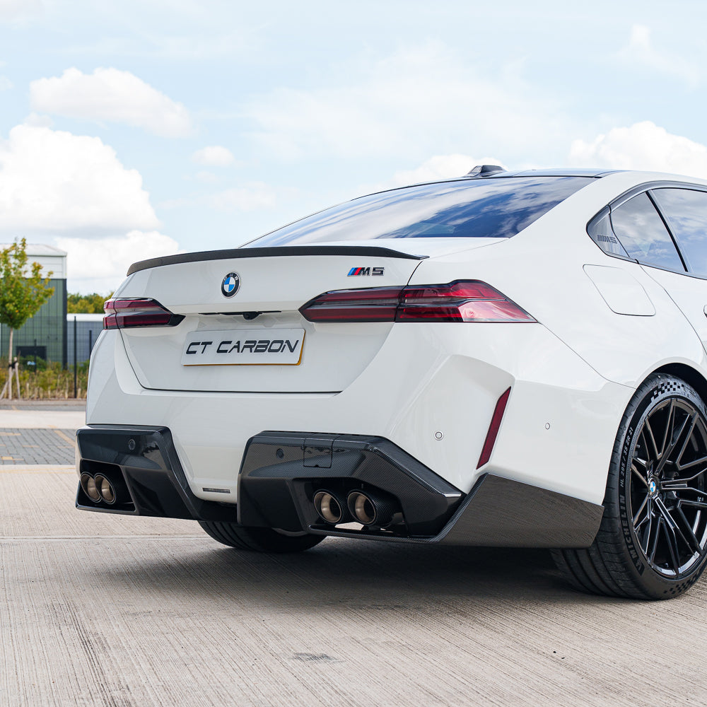 BMW G90 M5 2024 carbon fibre full kit by CT Carbon, featuring aerodynamic body parts and sleek design elements.