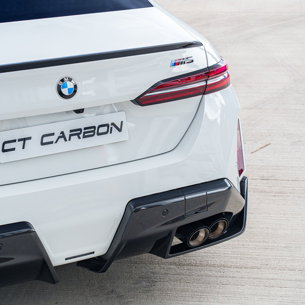 BMW G90 M5 2024 carbon fibre full kit by CT Carbon, showing detailed panels and sleek design elements.