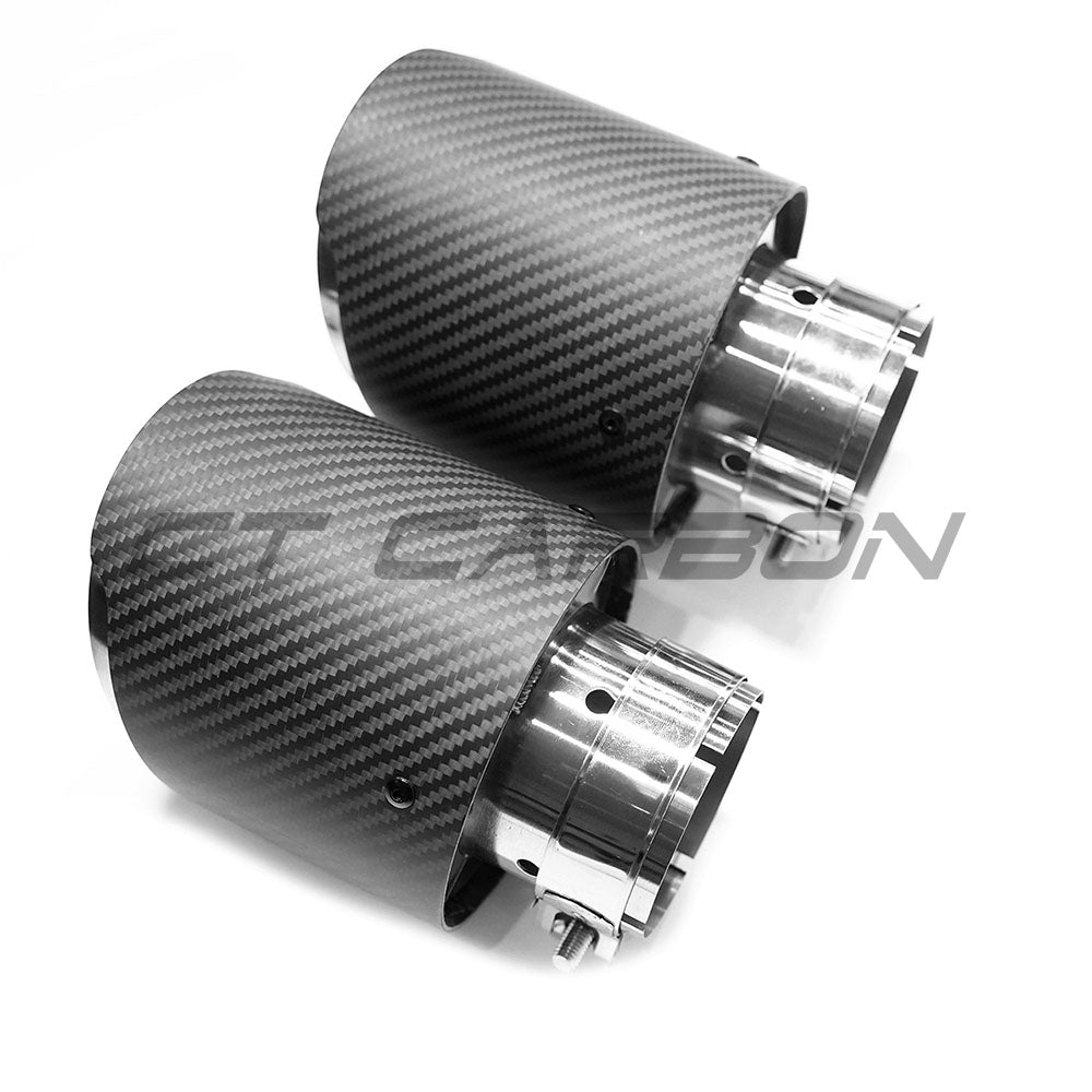 Hyundai i30N carbon fibre exhaust tips by CT Carbon, showcasing sleek, aerodynamic design with a glossy black finish.