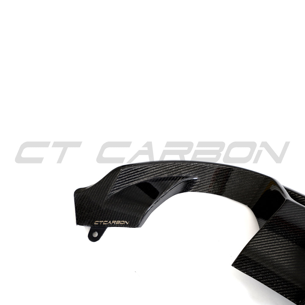 Hyundai i30N carbon fiber diffuser for facelift models by CT Carbon, showcasing its sleek design and textured carbon finish.