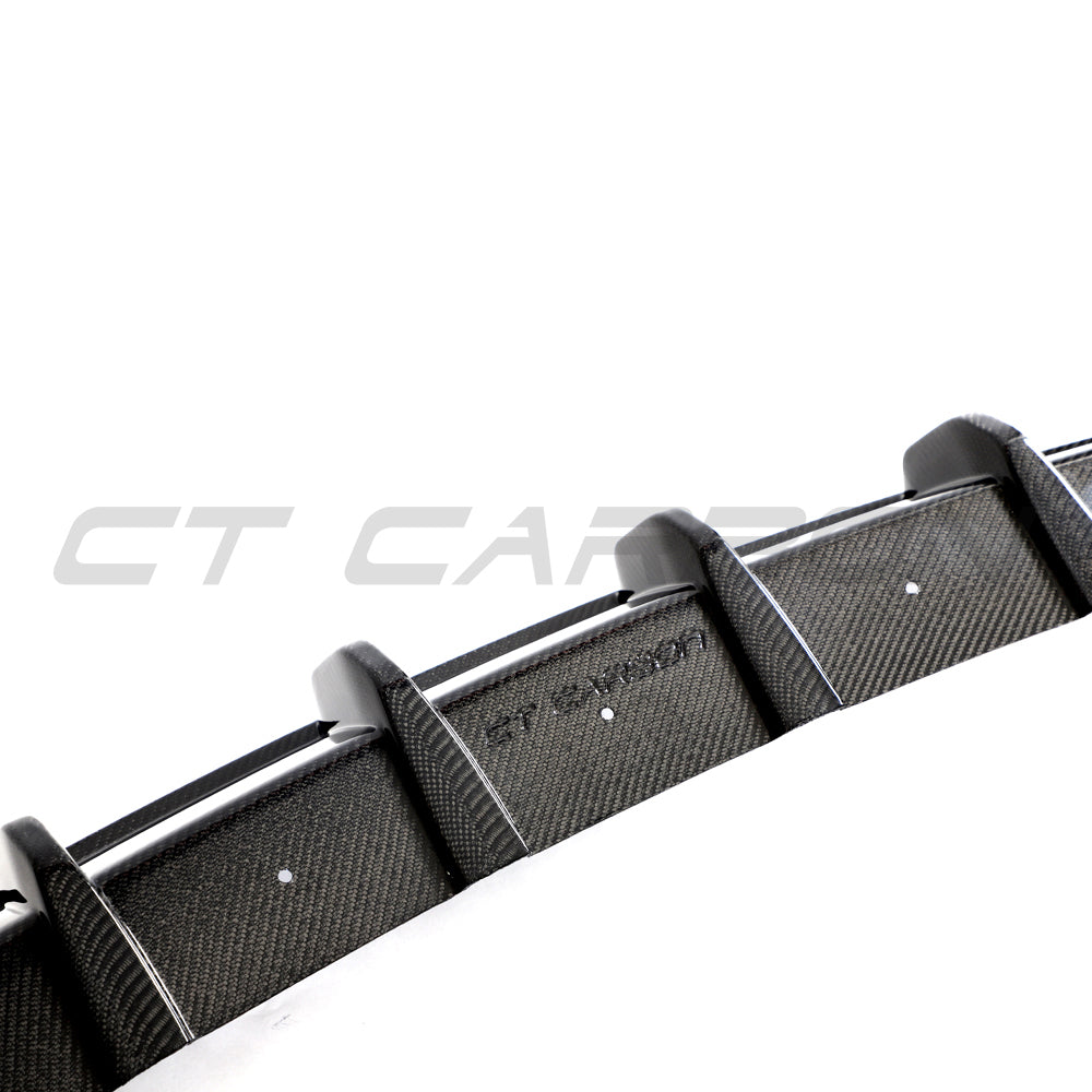 Hyundai i30N carbon fibre diffuser splitter by CT Carbon, pre-facelift model, showcasing sleek black carbon fiber finish.