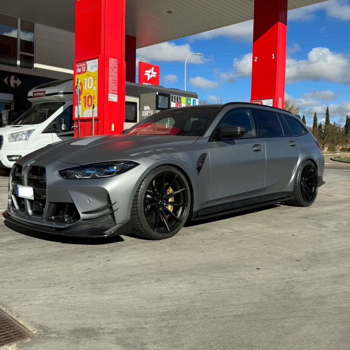 BMW M3/M4 G80 G81 G82 G83 carbon fibre front bumper canards by CT Carbon, showcasing sleek aerodynamic accessories.