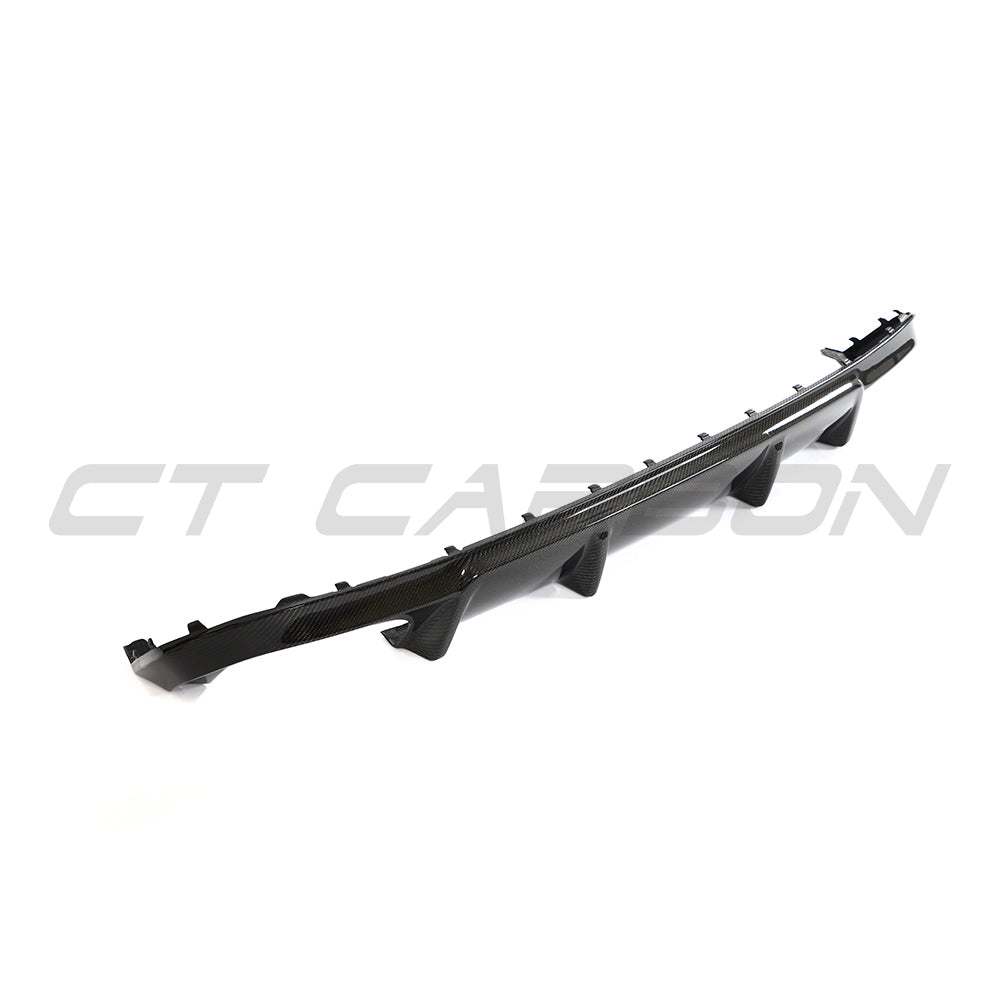 BMW G26 4 Series 2020+ carbon fibre diffuser by CT Carbon, showcasing sleek design and textured carbon fiber finish.