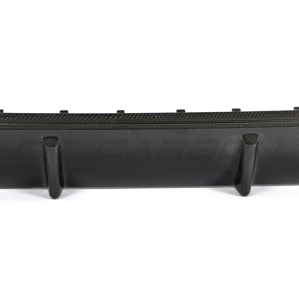 BMW G26 4 Series 2020+ carbon fiber diffuser by CT Carbon, showcasing sleek black aerodynamic design and textured finish.