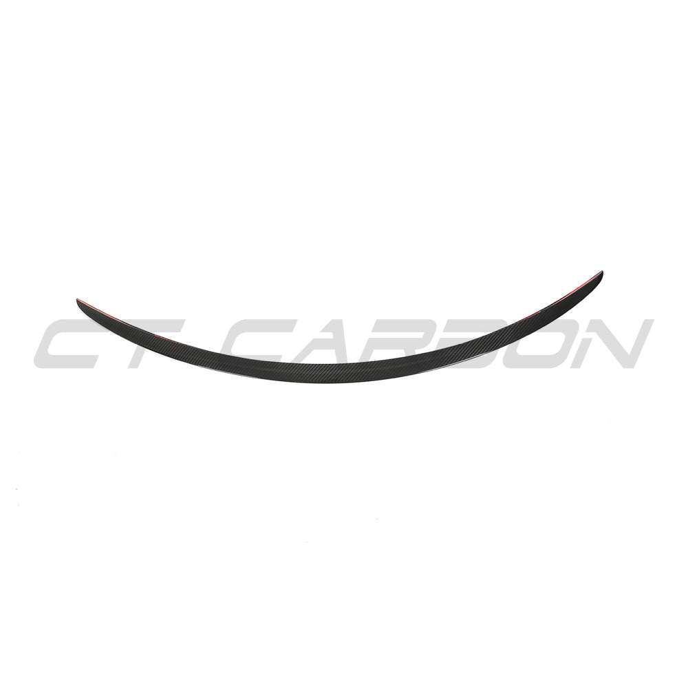 Tesla Model S 2012-2016 carbon fiber spoiler by CT Carbon, rear aerodynamic upgrade, sleek black finish, detailed close-up shot.