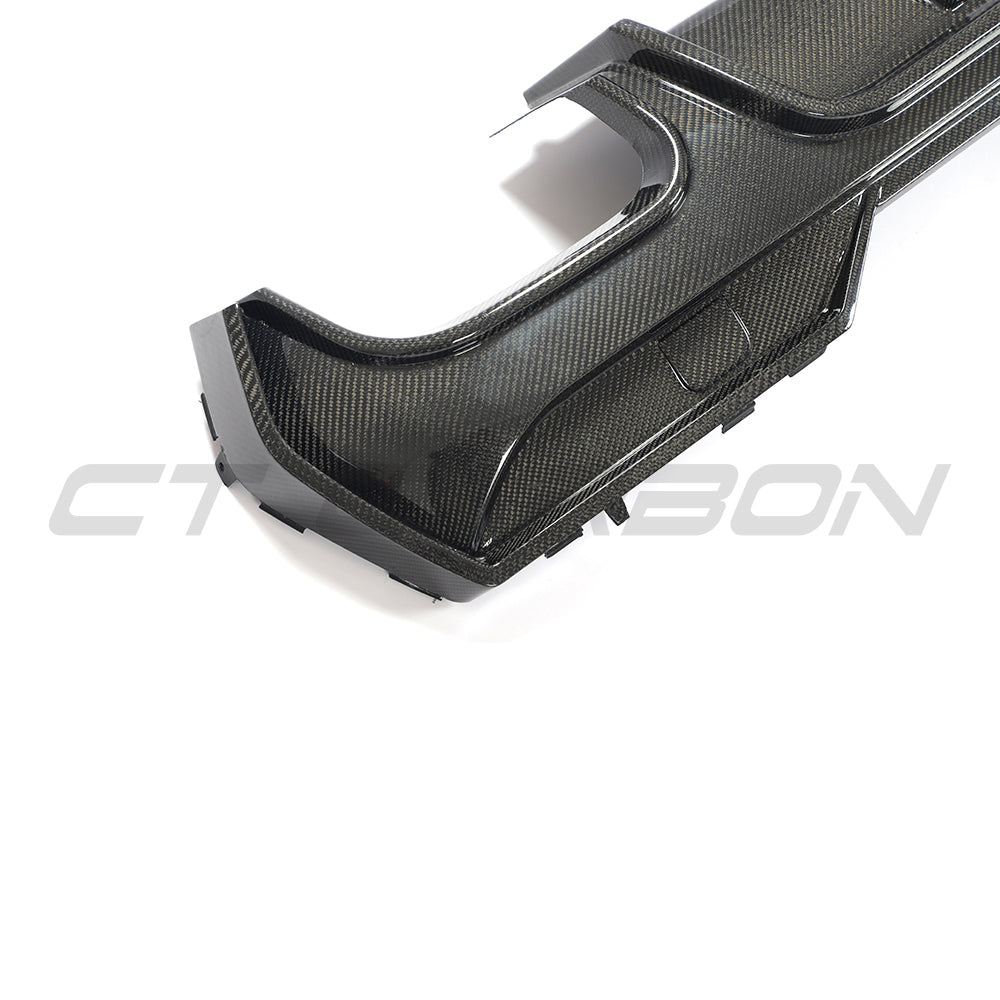 BMW G22 G23 4 Series 2020-2024 pre-LCI quad tip carbon fiber diffuser by CT Carbon, showcasing sleek aerodynamic design.