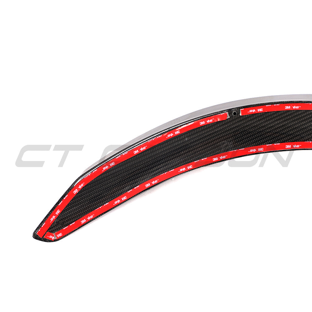 Carbon fiber spoiler for BMW 8 Series G15/F92 M8, V1 style, showcasing sleek aerodynamic design on the car's rear.