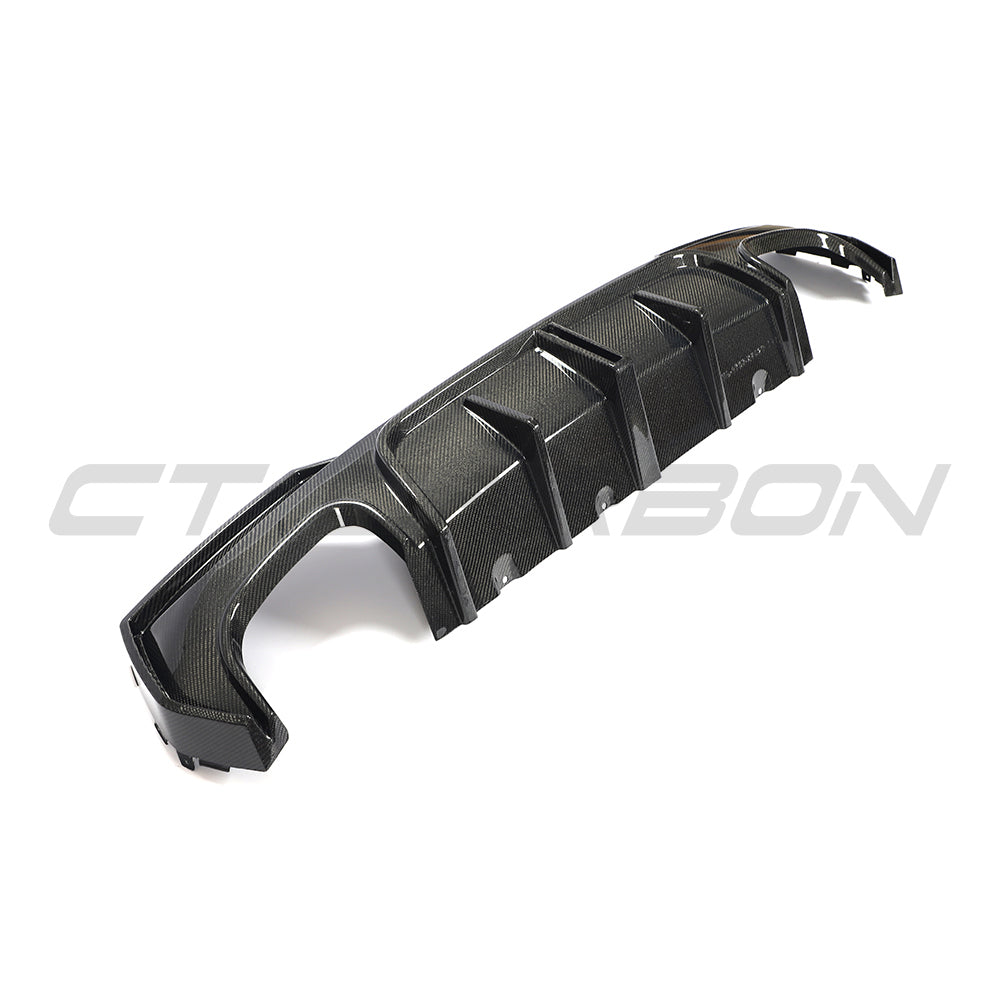 BMW G22 G23 4 Series 2020-2024 carbon fiber diffuser with quad tip design by CT Carbon, V2 model, shown on vehicle.