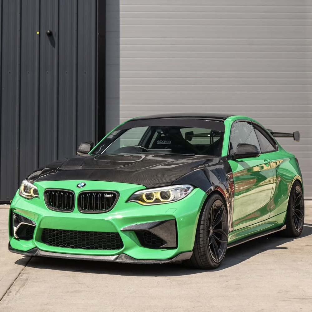 BMW F87 M2/M2C CT Carbon full carbon fiber car kit with aerodynamic parts, shown on a white background.
