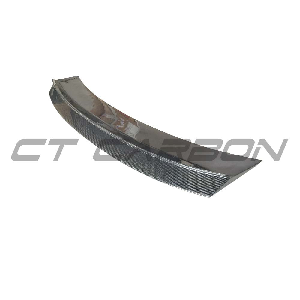Carbon fibre spoiler for Audi TT/TTS MK3 by CT Carbon, showcasing sleek, aerodynamic design on a silver vehicle.