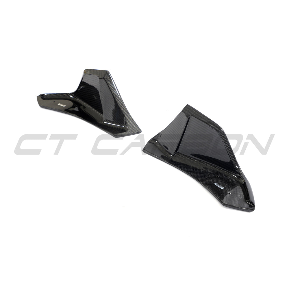 Toyota Supra 2019+ A90 carbon fiber front bumper corners by CT Carbon, close-up of sleek, lightweight car accessory design.