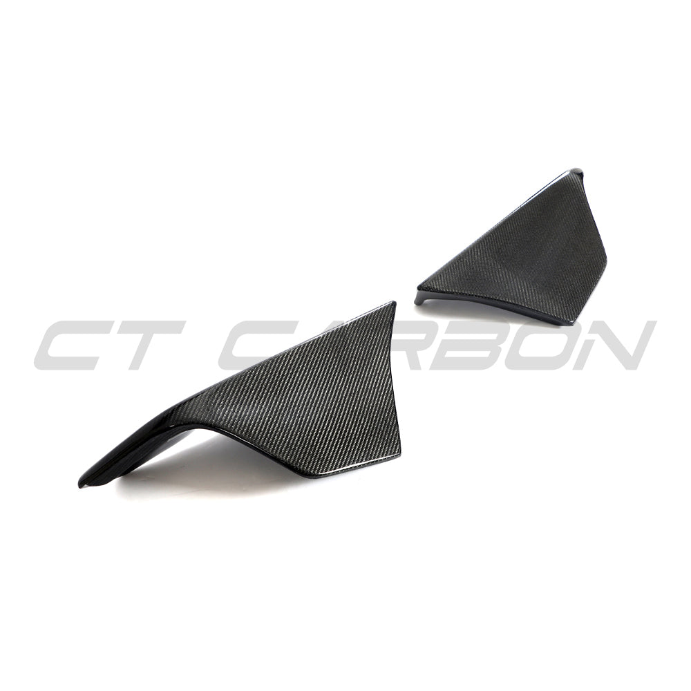 Toyota Supra 2019+ A90 carbon fiber front bumper corners by CT Carbon, close-up of sleek, lightweight automotive accessories.