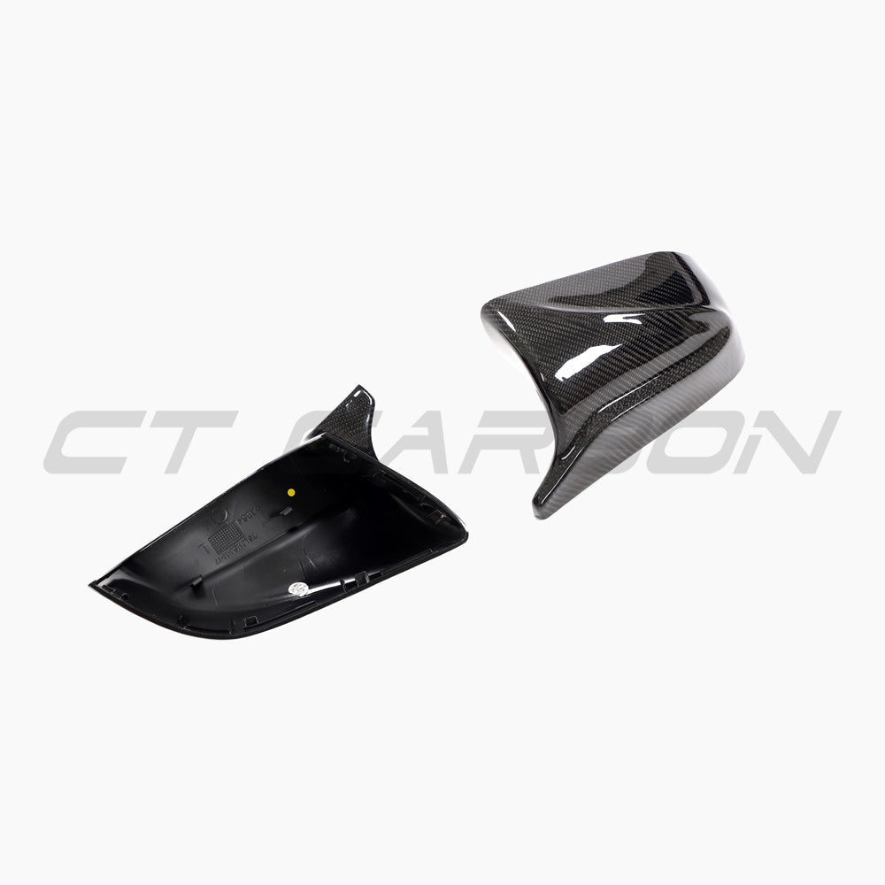 Tesla Model 3 2017+ carbon fibre side mirrors by CT Carbon, V2 accessories, featuring sleek, lightweight design and glossy finish.