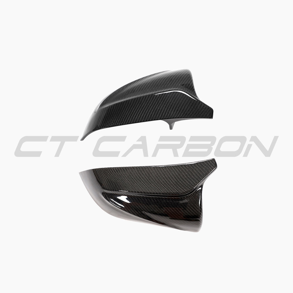 Tesla Model 3 2017+ carbon fibre mirror covers by CT Carbon, V2, sleek aerodynamic accessories for enhanced style and protection.