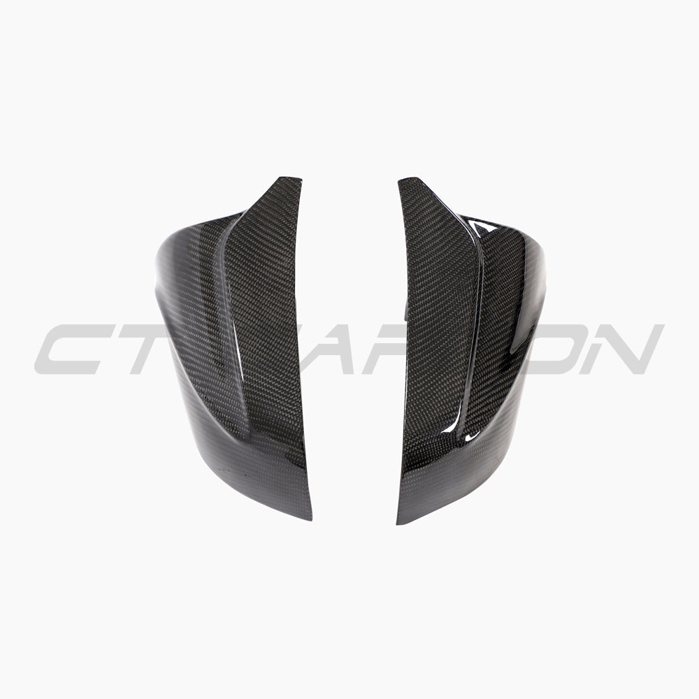 Tesla Model 3 2017+ carbon fibre mirror covers by CT Carbon, V2 accessories, close-up view of sleek carbon fibre mirror caps.