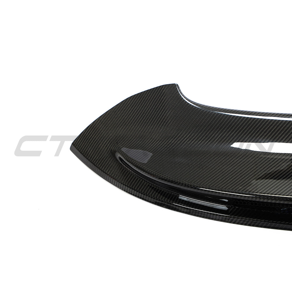CT Carbon Porsche 992 Carrera GTS 2018+ carbon fiber replacement ducktail spoiler mounted on a sports car.