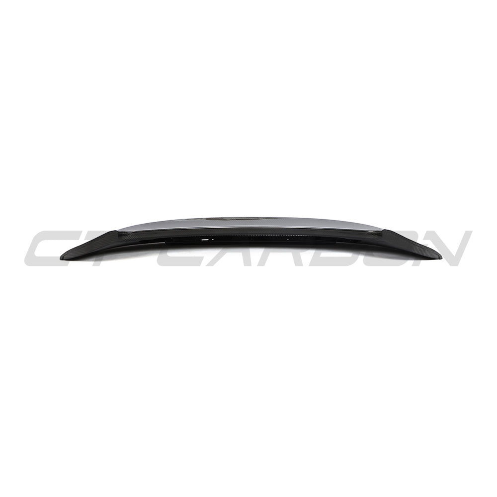 CT Carbon Porsche 992 Carrera GTS 2018+ carbon fiber replacement ducktail spoiler on a sports car.