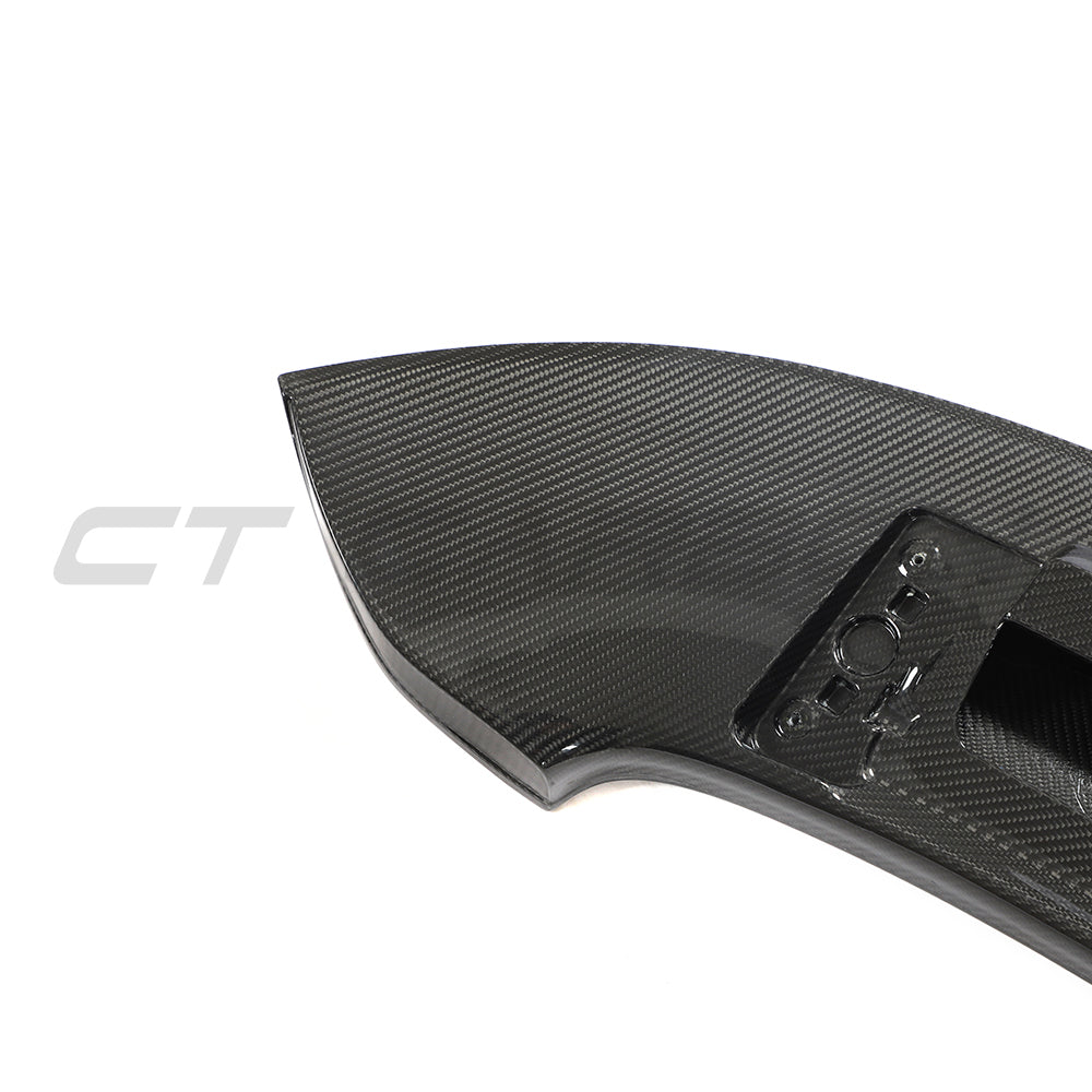 CT Carbon Porsche 992 Carrera GTS 2018+ carbon fiber replacement ducktail spoiler on a sports car.