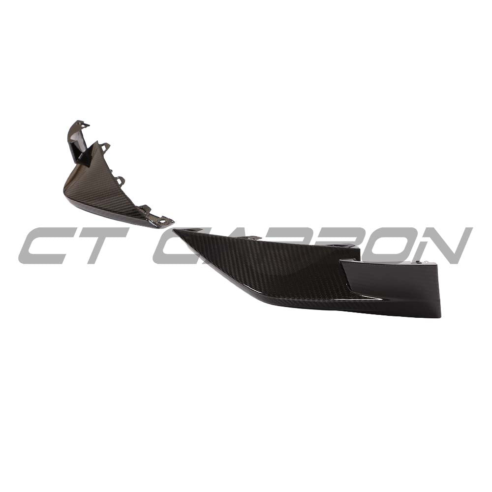BMW M3 M4 G80 G81 G82 G83 carbon fibre front bumper corner replacements by CT Carbon, showing sleek, lightweight accessory details.