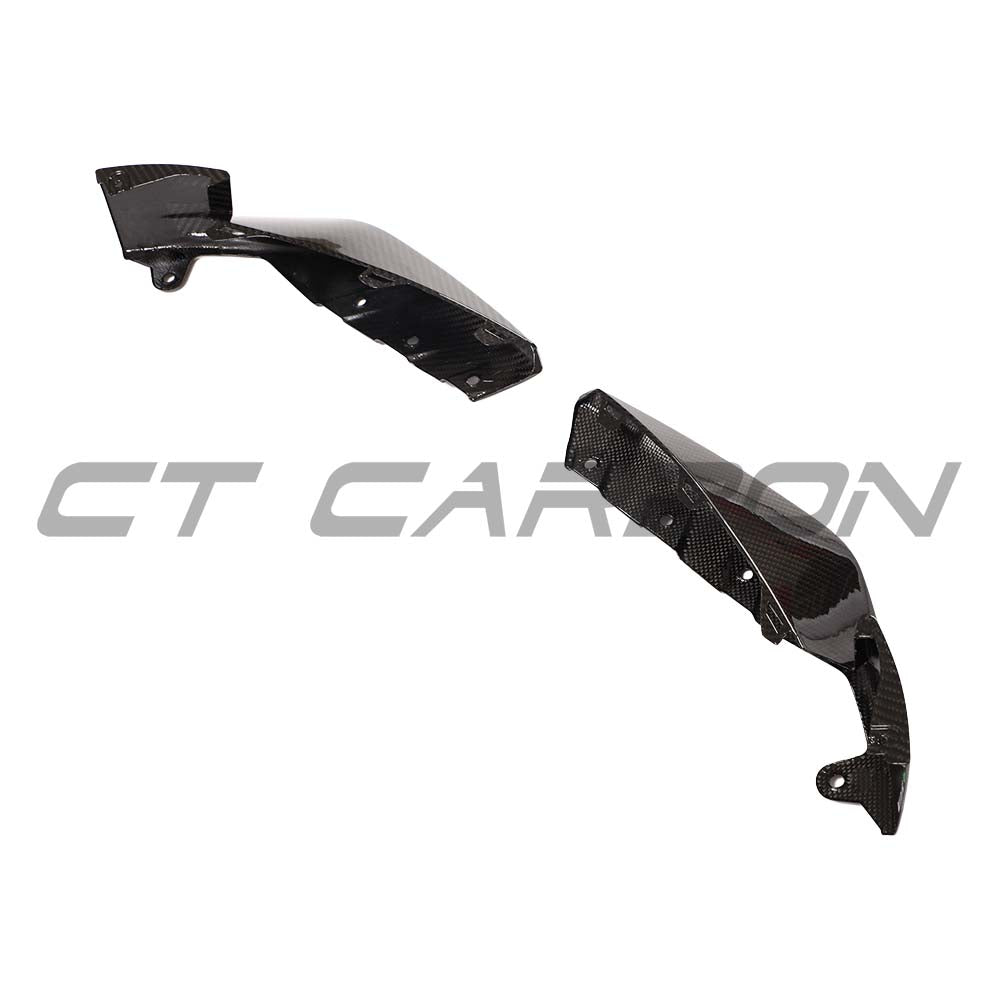BMW M3 M4 G80 G82 carbon fiber front bumper corner replacements by CT Carbon, showcasing sleek, lightweight automotive accessory.