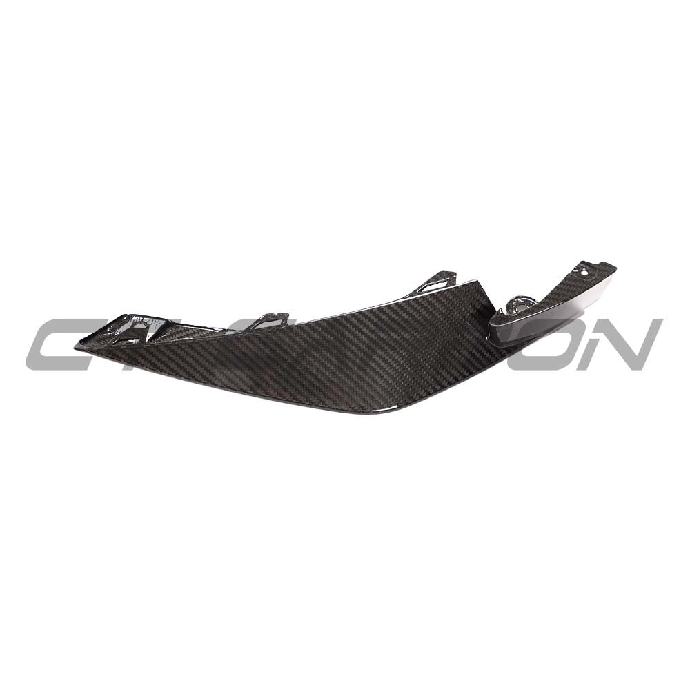 BMW M3 M4 G80 G82 G83 carbon fibre front bumper corner replacements by CT Carbon, showing close-up of sleek, lightweight accessory.