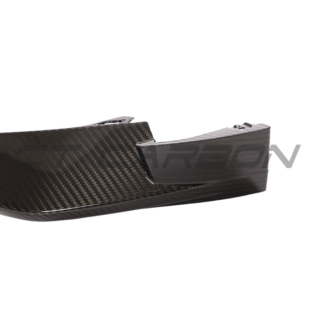 BMW M3 M4 G80 G82 G81 G83 carbon fibre front bumper corner replacements by CT Carbon, showing close-up of sleek, lightweight accessory.