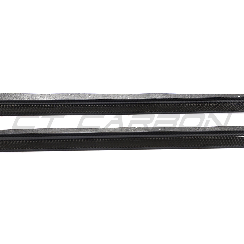 BMW 8 Series and M8 G16/F93 carbon fibre side skirts by CT Carbon, showing sleek aerodynamic design and high-quality finish.