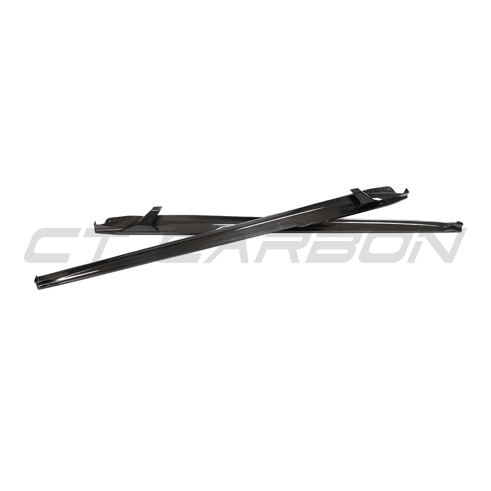CT Carbon Porsche 911 991.2 GTS 2017-2019 carbon fiber side skirt extensions on a sports car.